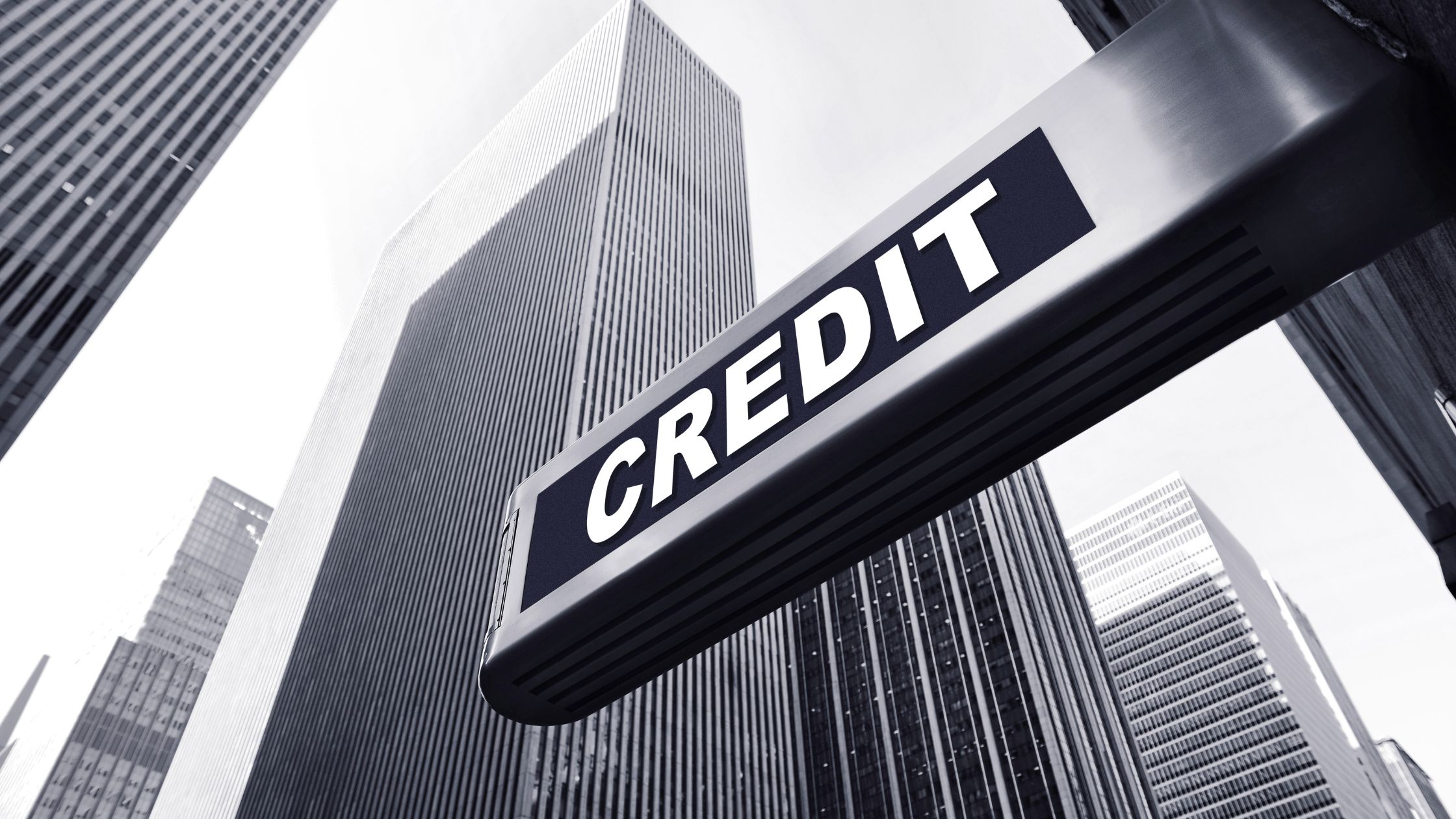 credit sign in busy city