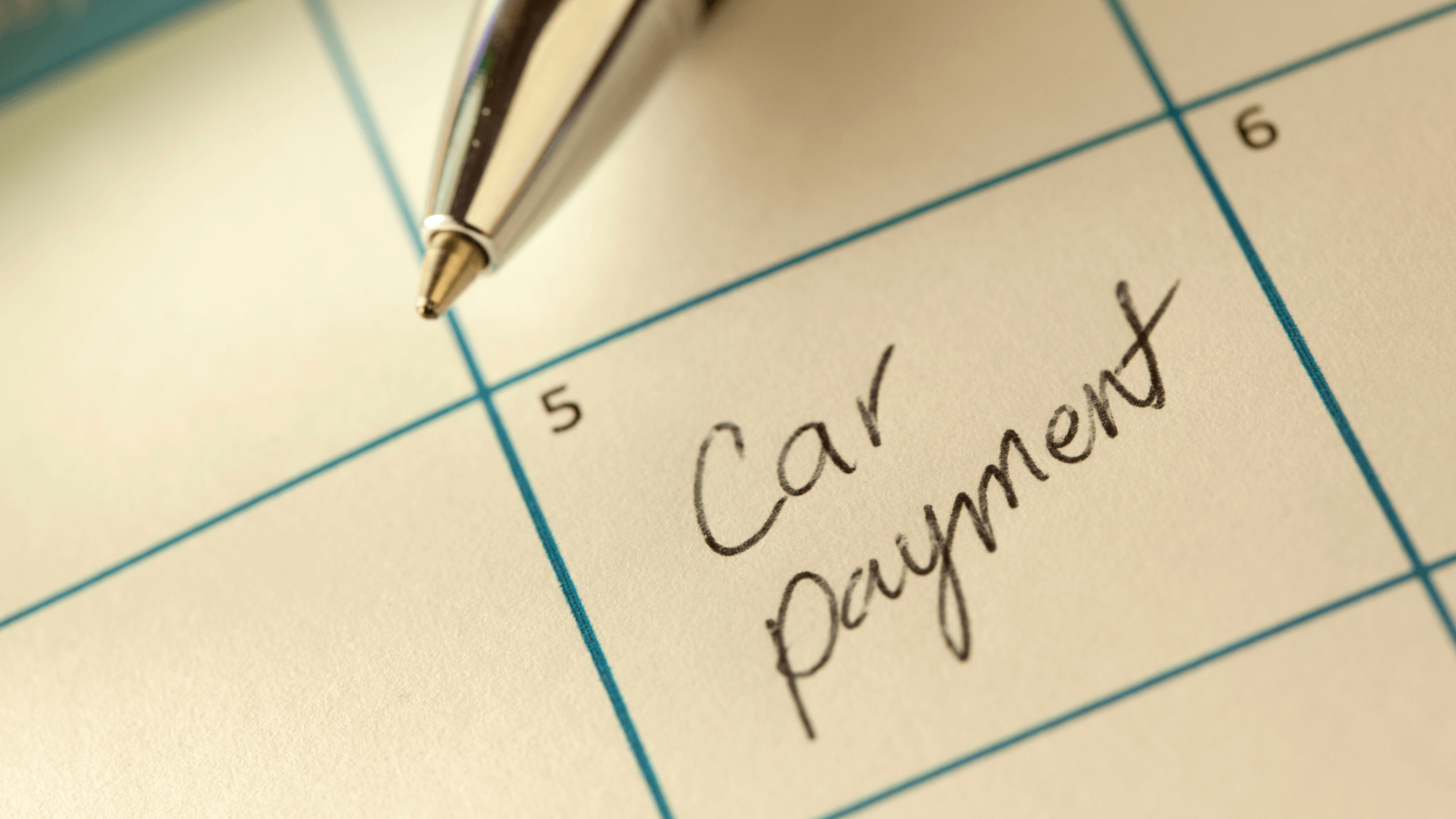 car payment written on calendar